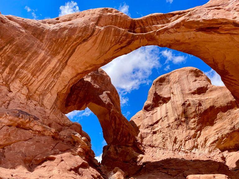 Breathtaking view of rock formations and blue sky at Arches National Park, Utah.